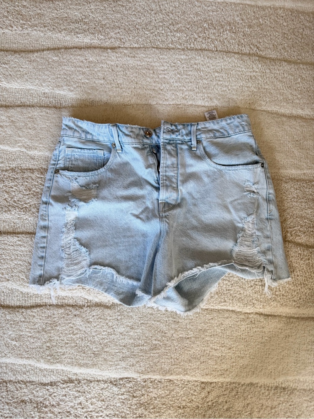 Good American Light Blue Distressed Denim Cutoff Shorts